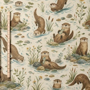 May include: A light beige fabric featuring a repeating pattern of brown otters in a river setting with green reeds, yellow flowers, and small fish. Two wooden rulers are placed vertically on the left side, showing measurements in centimetres.