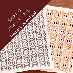 以下が含まれることがあります： 豚の顔が刺繍された白い布の正方形が2つ。1つは茶色の糸、もう1つはオレンジ色の糸を使用。テキスト「SASHIKO 2PDF PATTERN Instant Download」は、濃い赤褐色の背景に表示されています。