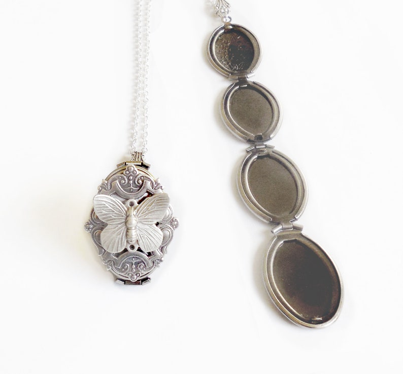 Puede incluir: Un collar con un medall&oacute;n de plata adornado con un dije de mariposa. El medall&oacute;n se abre para revelar varios compartimentos para fotos o recuerdos.