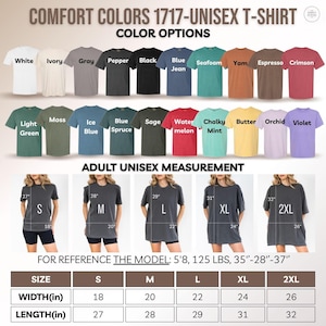 Pode incluir: Imagem de uma camiseta unissex Comfort Colors 1717 com op&ccedil;&otilde;es de cores e medidas unissex para adultos. As cores incluem branco, marfim, cinza, pimenta, preto, azul jeans, espuma do mar, inhame, caf&eacute; expresso, carmesim, verde claro, musgo, azul gelo, abeto azul, s&aacute;lvia, melancia, menta giz, manteiga, orqu&iacute;dea e violeta.