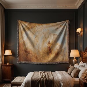 May include: A large, rectangular tapestry with a classical painting of a figure holding a staff, set against a swirling, light-colored background. The tapestry is fringed and hangs on a dark wall above a bed. The room is decorated with lamps and wooden furniture.
