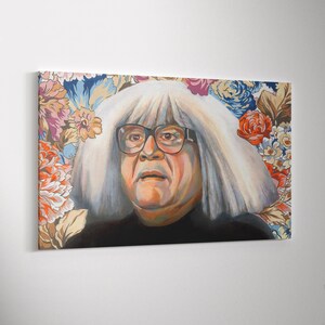May include: A canvas print featuring a portrait of a person with white hair and glasses, set against a backdrop of colorful flowers. The person is wearing a black shirt. The artwork has a painted appearance.
