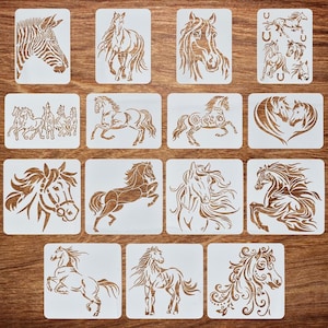 May include: A collection of horse stencils in various designs, including a zebra, galloping horses, and detailed horse heads. The stencils are cut from a light-colored material and are arranged on a wooden surface.