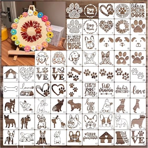 May include: A wooden craft display featuring a sunflower design and various dog-themed stencils. The stencils include paw prints, dog breeds, and phrases like "Dog Mom" and "Love". The display is on a small wooden easel.