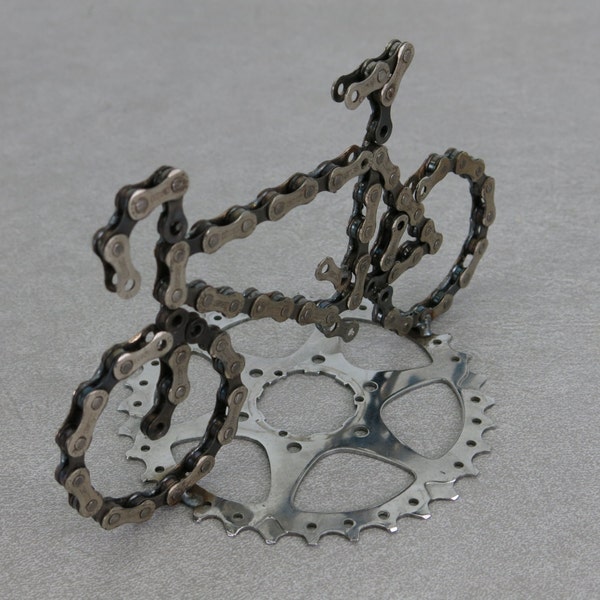 Road Bike With Sprocket Stand Made From Recycled Bike Chain