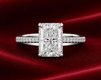 Förlovningsring i sterlingsilver med strålande slipning på ca 5 karat moissanit och accentstenar