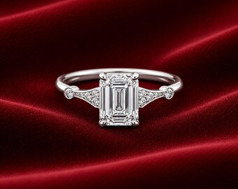 Förlovningsring i sterlingsilver med smaragdslipning, ca 3 karat, moissanit och accentstenar