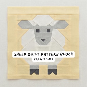 May include: A fabric quilt block featuring a geometric sheep design. The sheep is composed of white, gray, and black fabric pieces, set against a light yellow background. Text on the block reads "SHEEP QUILT PATTERN BLOCK FPP IN 3 SIZES."