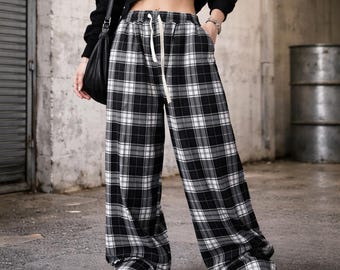 Czarne spodnie w kratę z szerokimi nogawkami | Spodnie streetwearowe Y2K | Grunge