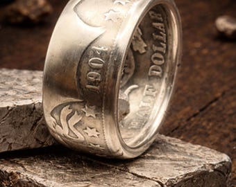 Zilveren kappersring met halve dollar
