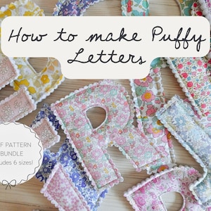 May include: Colorful fabric letters with floral patterns and scalloped edges are arranged on a wooden surface. The image includes text that reads "How to make Puffy Letters" and "PDF Pattern Bundle includes 6 sizes!"
