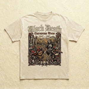 May include: Beige t-shirt featuring a graphic with the text "Black Death European Tour 1347-1351". The graphic depicts a skeleton with a scythe, rats playing instruments, and a castle.
