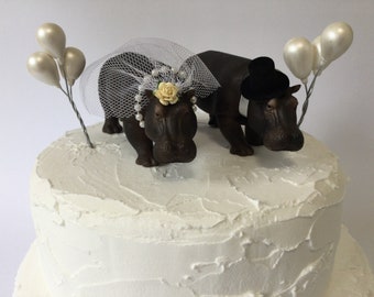 Hippopotamus wedding cake topper Bride and groom Hippos with miniature clay balloons.