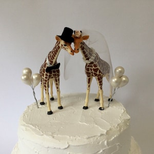 Giraffe wedding cake topper Bride and groom Animals with miniature clay balloons.
