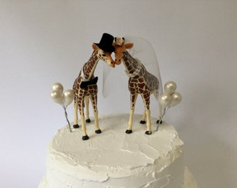 Giraffe wedding cake topper Bride and groom Animals with miniature clay balloons.