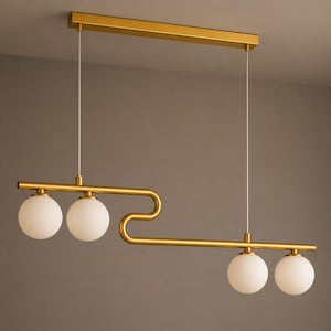 Lámpara de techo moderna lineal de latón con globo de cristal dorado para comedor.