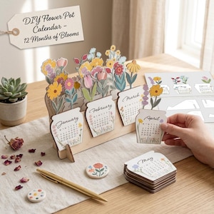 May include: A DIY flower pot calendar kit featuring wooden pieces with floral illustrations and monthly calendar grids for January through April. The set includes a wooden base, a stack of additional month cards, and a tag labelled DIY Flower Pot Calendar - 12 Months of Blooms.