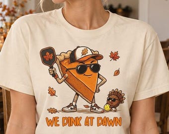 Thanksgiving Pickleball Shirt, We Dink At Dawn Funny Turkey Tee, Fall Pumpkin Pie Graphic Tshirt, Autumn Sports Player Gift