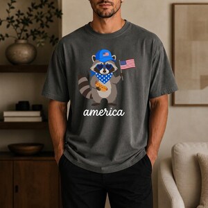 Patriotic Raccoon America Graphic Tee, Funny USA Hot Dog Shirt, 4th of July Outfit, Retro Patriotic Animal Gift image 2