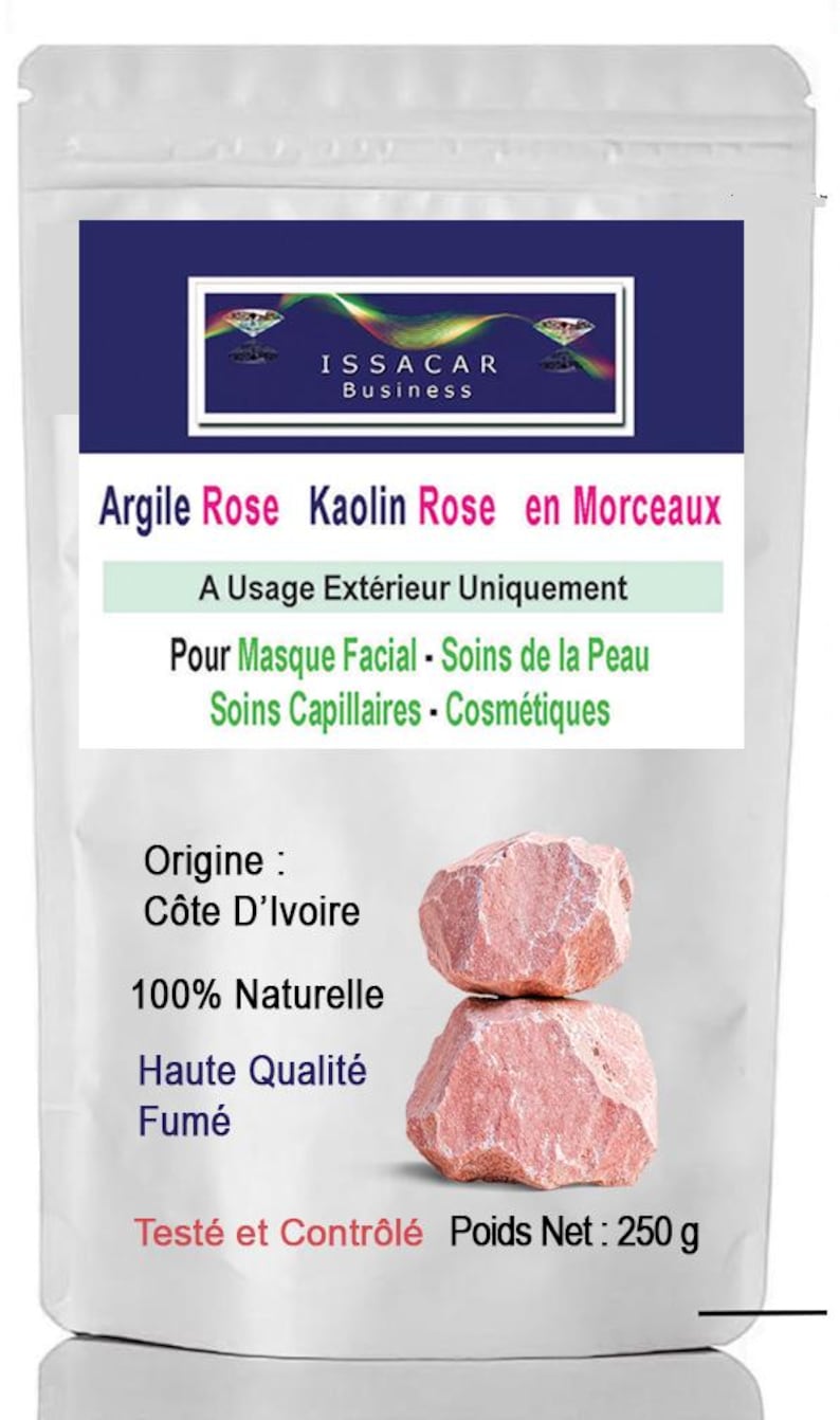 May include: A white package with text in French, featuring two pink clay chunks. The text includes "Argile Rose Kaolin Rose en Morceaux" and "Pour Masque Facial - Soins de la Peau". The net weight is 250 g.