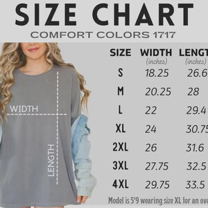 May include: A size chart for a Comfort Colors 1717 t-shirt, displaying width and length measurements in inches for sizes S through 4XL. The chart includes a visual guide on a grey t-shirt, noting a model height of 5'9 wearing an XL for an oversized fit.