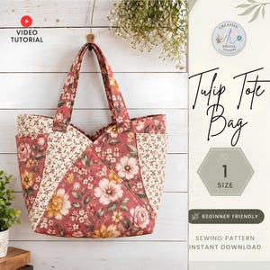 May include: A tote bag featuring a floral pattern with pink, cream, and yellow flowers on a dusty rose background. The bag has two handles, a V-shaped front panel, and side pockets. Text on the image includes Tulip Tote Bag, 1 Size, and Beginner Friendly.