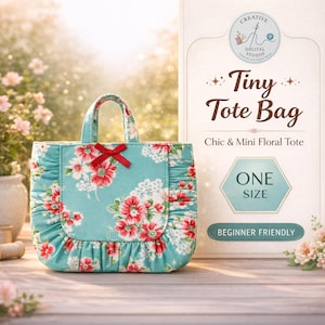 May include: A small, floral tote bag with a turquoise background and red and white flowers. The bag has a red bow and a ruffled edge. The text on the sign says "Tiny Tote Bag" and "Chic & Mini Floral Tote". The bag is "Beginner Friendly".