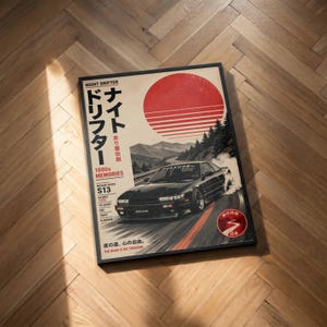 May include: A rectangular poster featuring a black Nissan Silvia S13 drifting on a road, with a large red sun graphic, mountains, and pine trees in the background. The text includes Night Drifter, 1980s Memories, and The Road Is My Freedom.