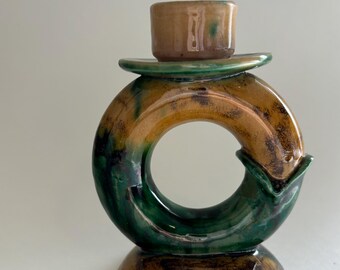 Rare, MCM brown and green single candleholder with a sculptural and unique open form made in retro-European Austrian ceramic style.