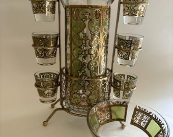 Rare, midcentury Starlyte vintage barware set, with a 22k-gold-leaf pump dispenser, six shot glasses, matching bowl and ornate brass caddy