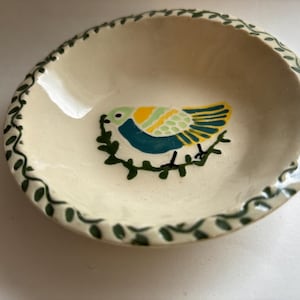 Small, vintage decorative bird signed studio pottery dish/bowl for jewelry, trinkets or catch-all items with a hand painted nature motif.
