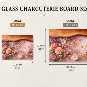 May include: Glass charcuterie boards in small (8" x 11") and large (11" x 15") sizes. The boards feature a wooden edge and a floral design with pink, white, and purple flowers embedded in a clear resin.