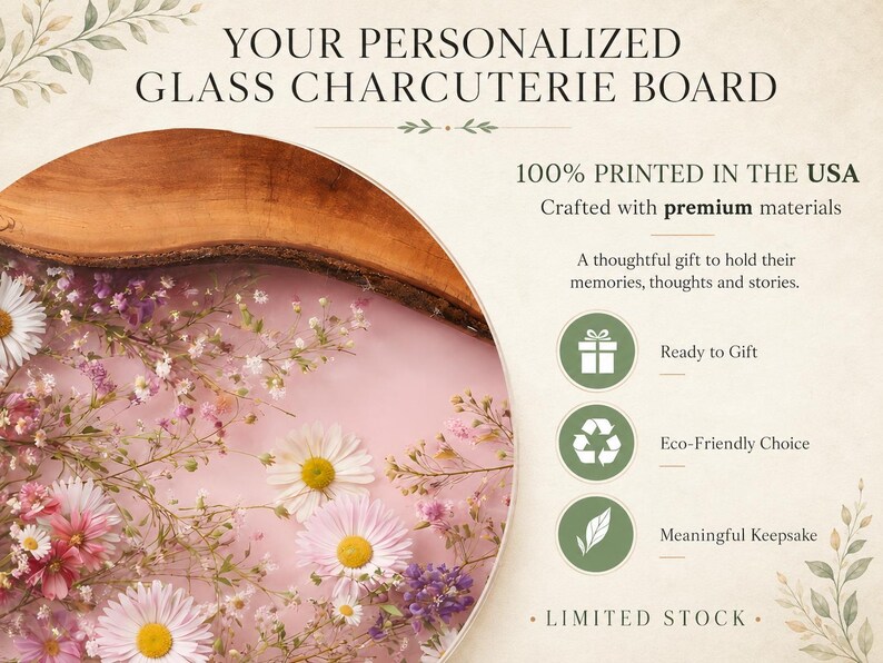 May include: A personalized glass charcuterie board with a wooden edge, featuring a pink floral design with daisies and other flowers. The text reads "YOUR PERSONALIZED GLASS CHARCUTERIE BOARD" and "100% PRINTED IN THE USA".