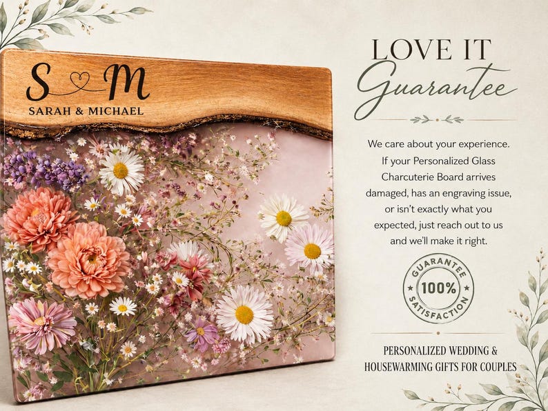 May include: A personalized charcuterie board with a wooden edge and a floral design. The board features the initials "S & M" with "Sarah & Michael" below. The board is decorated with pink, white, and purple flowers.