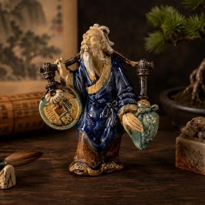 Pre-1890 Chinese Mudman Figurine | Unmarked 3.5" Shiwan Pottery Wise Man Carrying Yoke with Wealth Coin & Longevity Peach Hand-Pressed Clay