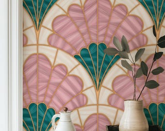 May include: Wallpaper featuring a repeating fan-shaped pattern in shades of dusty pink, deep teal, and cream, outlined with thin gold lines. A white ceramic pitcher and a dark brown woven basket containing a leafy green plant sit in front.