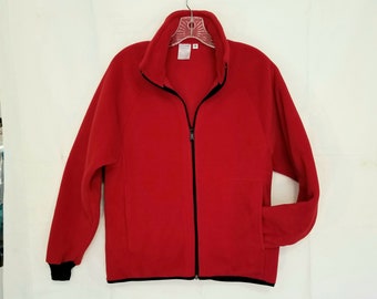 Red fleece jacket for men or women in unisex sizes from XS to XXL, inside zip pocket. Handmade clothing made from  fleece from Polartec LLC.