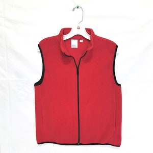 Red fleece vest for men or women handmade from thick plushy fleece from Polartec LLC.  Inside zip pocket. Unisex sizes XS to XXL.