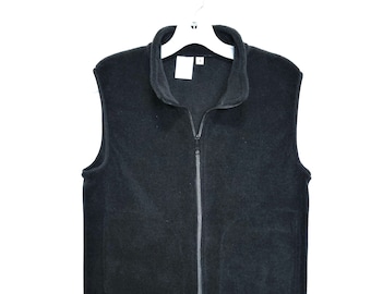 Black fleece vest for men or women with inside zip pocket,  Unisex sizes.   Premium fleece from Polartec LLC.  Choose your size