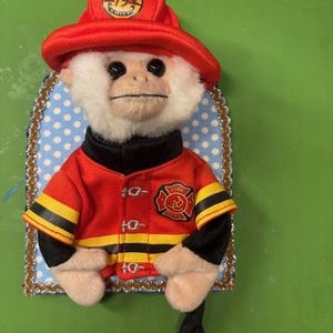 Placa de bombero mono