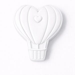 May include: A white, heart-shaped hot air balloon with a small heart in the center. The balloon has vertical lines and a basket at the bottom. The design is a solid, three-dimensional shape.