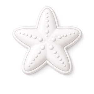 May include: A white ceramic mug with a black handle and the text "But First, Coffee" in a bold, black font. The mug is set against a blurred background, suggesting a cozy setting.