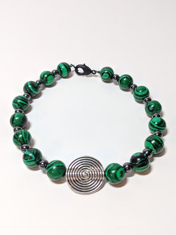 Hematite and malachite together deals