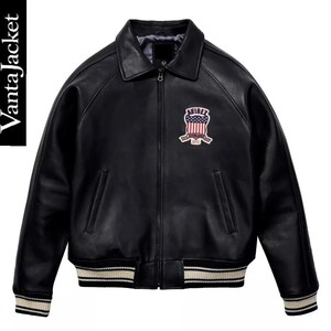 May include: Black leather jacket with a collar, zipper closure, and a patch on the chest. The jacket has a ribbed hem and cuffs with white stripes. The text "VantaJacket" is on the left side.