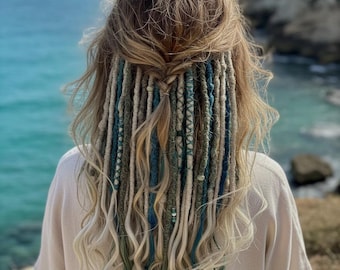 Blue ombre dreadlocks: kanekalon blonde and blue synthetic hair extensions with loose ends