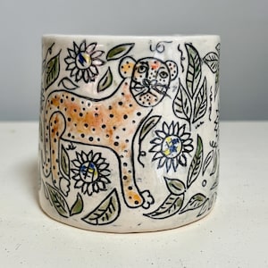 Handmade Stoneware Mug with Spotted, Orange Cat.  Mishima incised outlines.  Floral, leafy background.