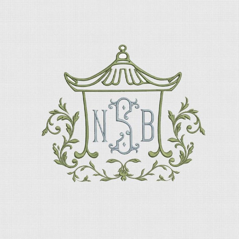 May include: An embroidery design featuring a light green pagoda-style roof outline framing a central light blue monogram with the letters N, S, and B. The design is accented by symmetrical light green scrolling leaf and vine motifs on both sides.