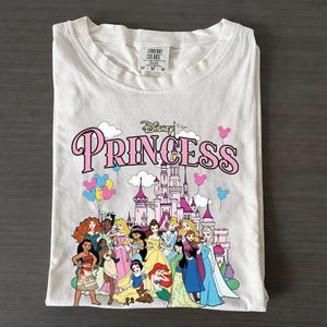 May include: A set of three ceramic mugs with a speckled, matte finish. The mugs are in shades of cream, light gray, and dark gray. Each mug has a simple, minimalist design, perfect for coffee or tea.