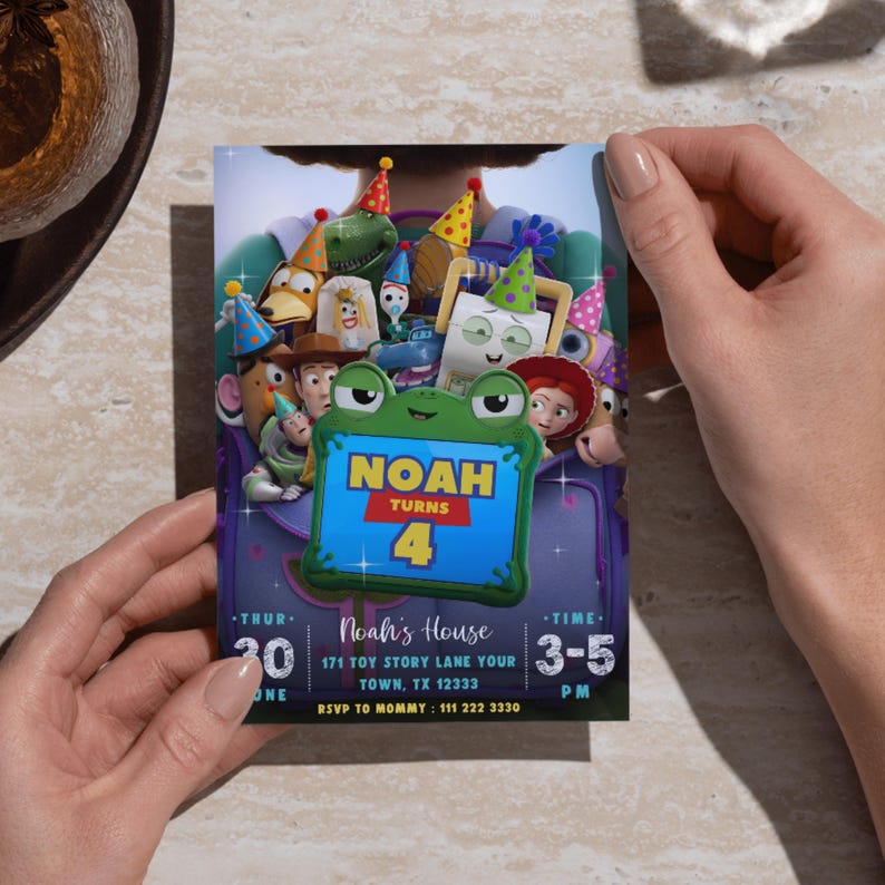 May include: A rectangular birthday invitation card featuring a group of animated toy characters wearing colorful party hats. A central green frog-shaped frame displays the text Noah turns 4. Below, event details include Noah's House, 171 Toy Story Lane, and 3-5 PM.