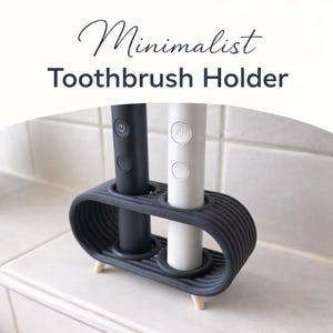 May include: A set of three ceramic mugs with a speckled, matte finish. The mugs are in shades of cream, light gray, and dark gray. Each mug has a simple, minimalist design, perfect for coffee or tea.